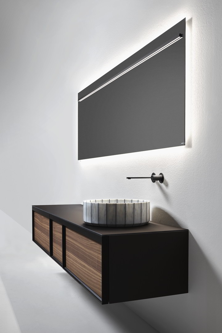 Its image is solid and statuary as that of a single block carved into the stone and polished by water.