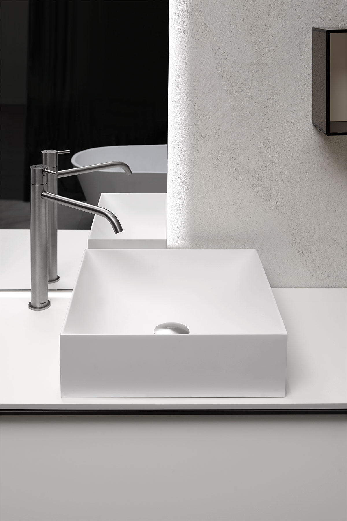 A sculptural shape, a volume ideally dug from the primordial force of water