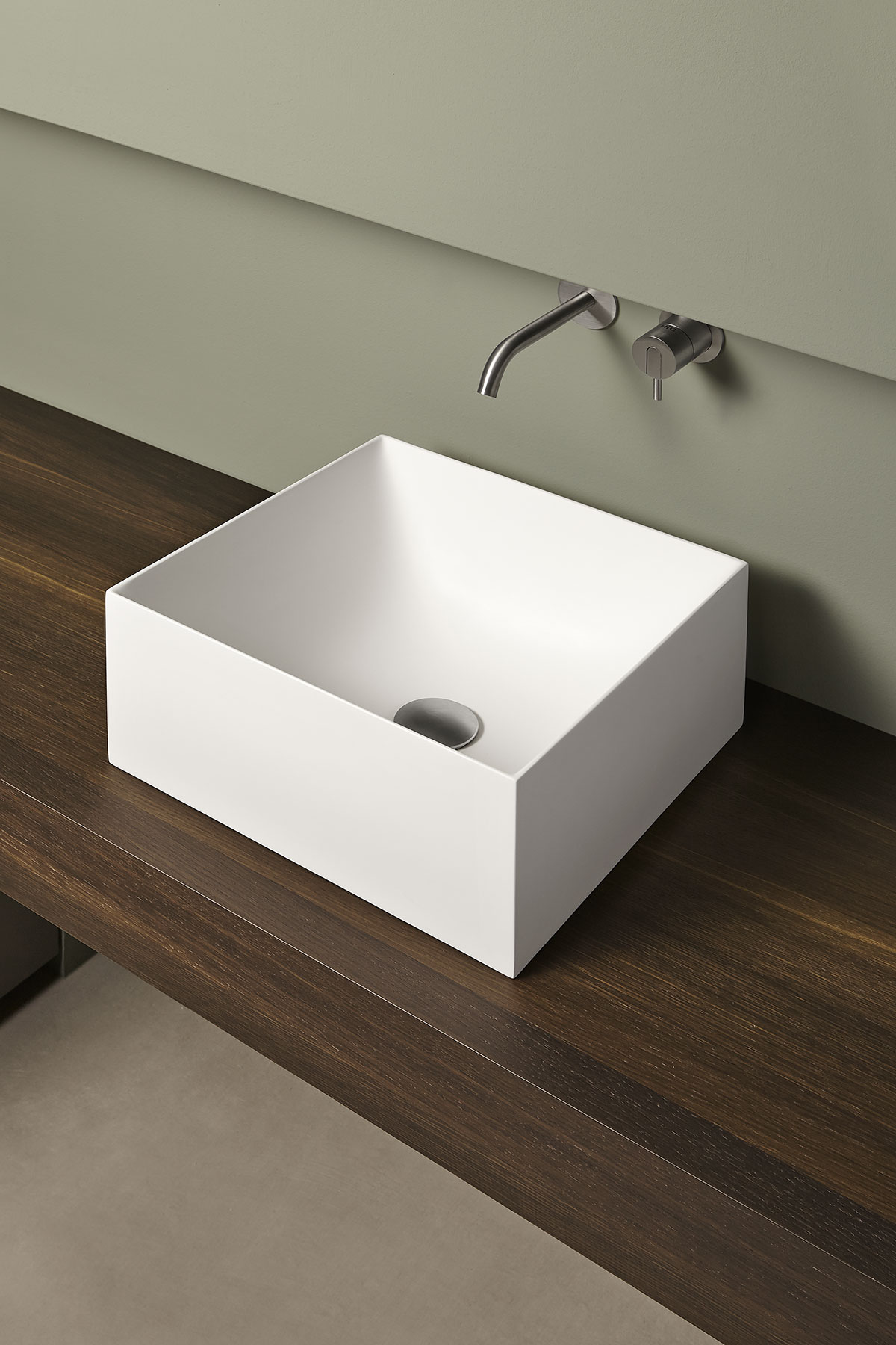 A sculptural shape, a volume ideally dug from the primordial force of water