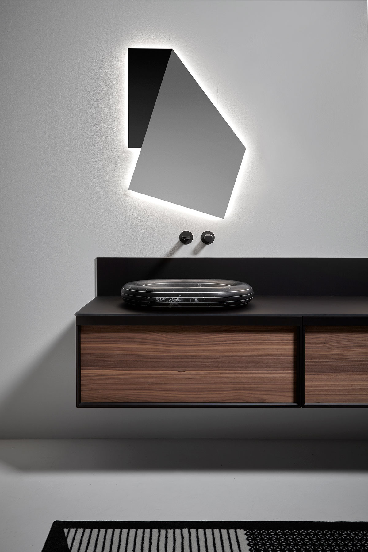 The excavation, the depth and the soft horizontal curves mark a new border between what is real and what is imagination.