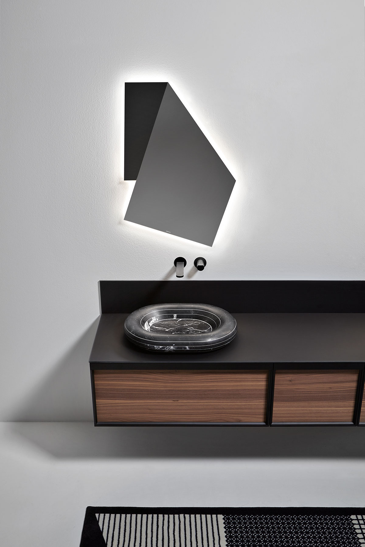 The excavation, the depth and the soft horizontal curves mark a new border between what is real and what is imagination.