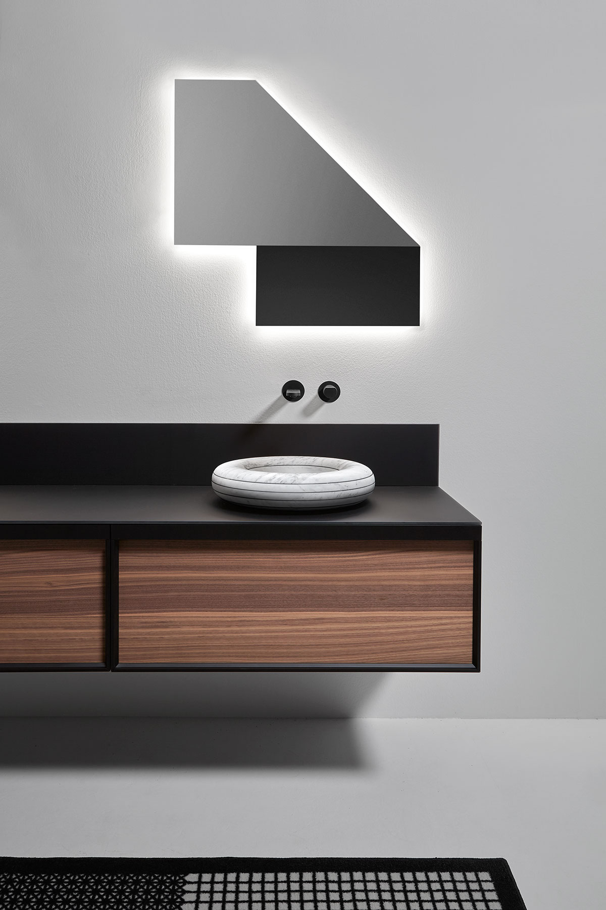 The excavation, the depth and the soft horizontal curves mark a new border between what is real and what is imagination.