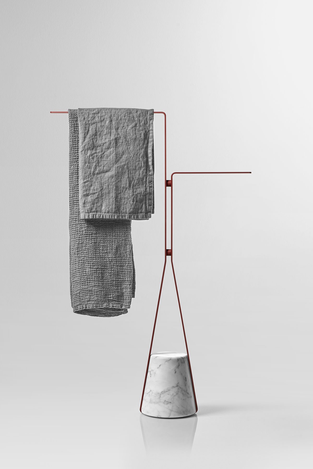 Like an elastic that is dragged downwards, but which then finds resistance and consistency to become a support in turn. 