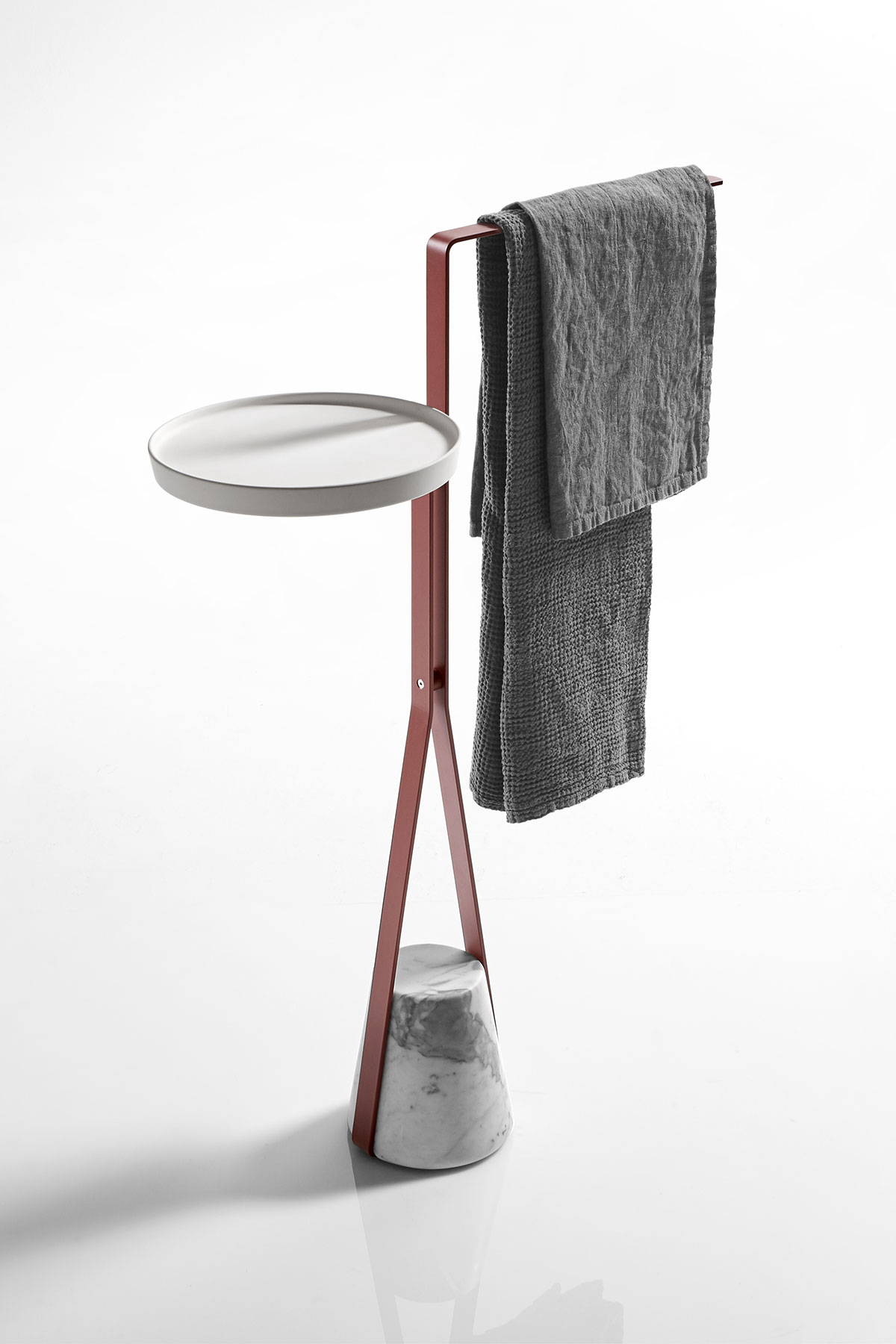 Like an elastic that is dragged downwards, but which then finds resistance and consistency to become a support in turn. 