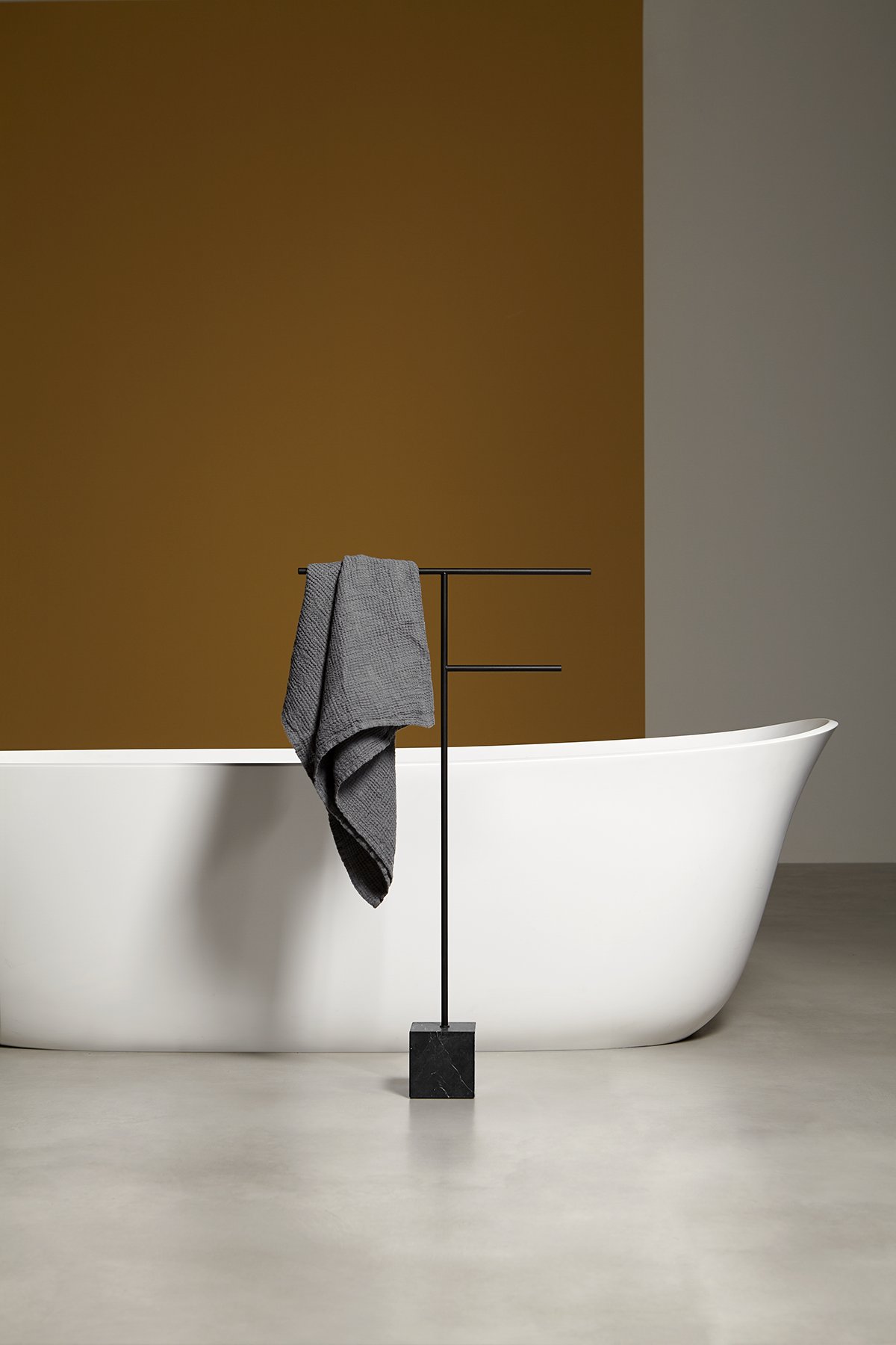 The cubic marble base refers to the precious heritage of the earth