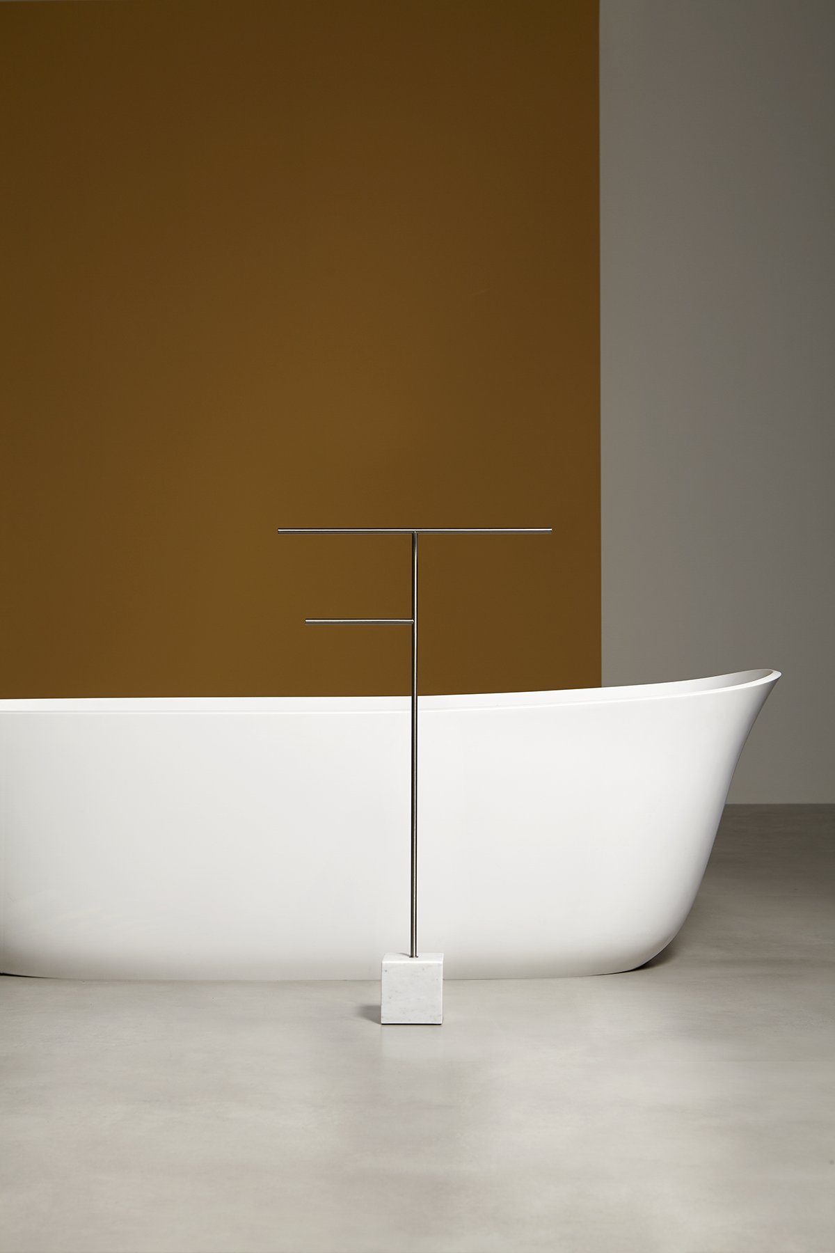 The cubic marble base refers to the precious heritage of the earth