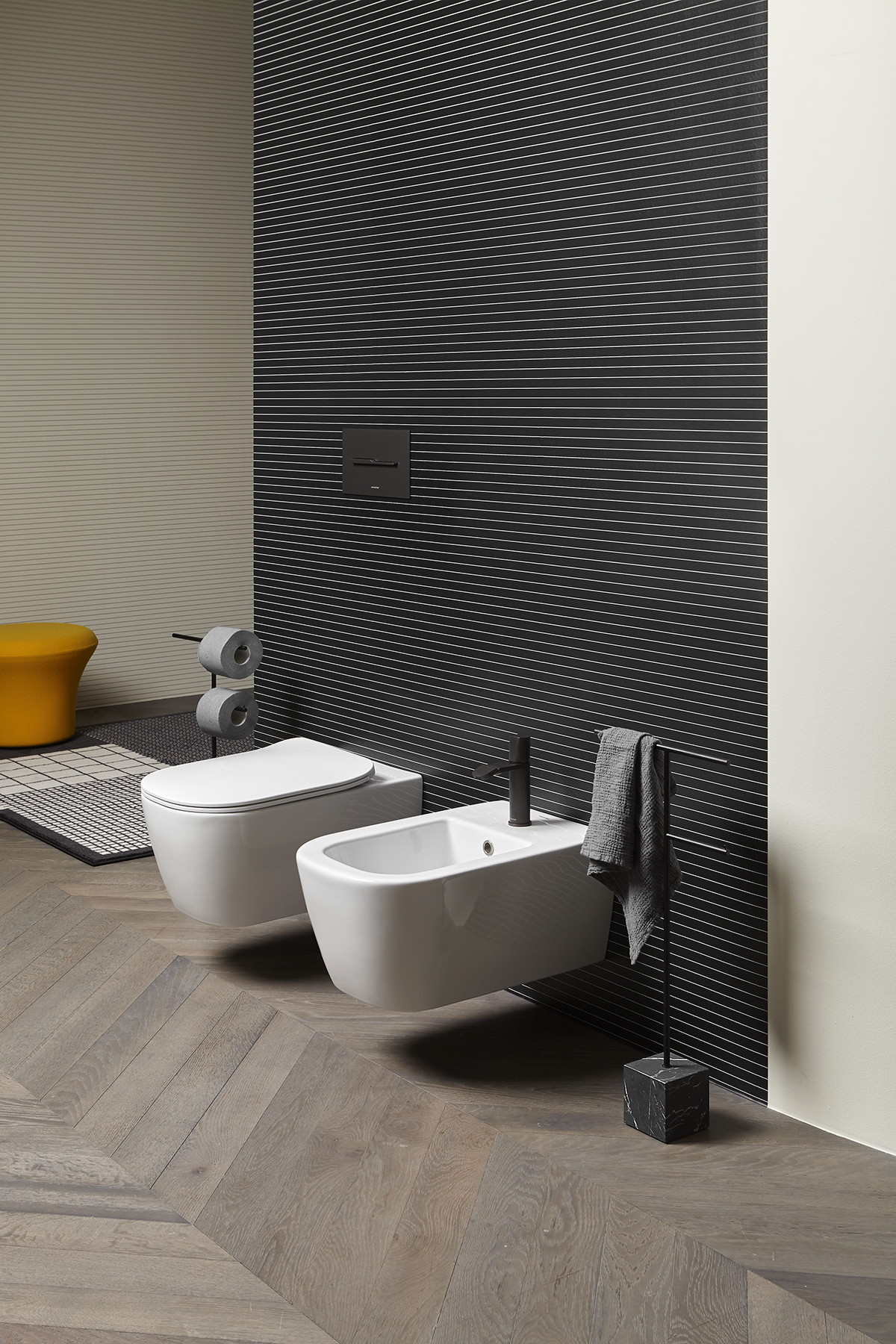 The cubic marble base refers to the precious heritage of the earth