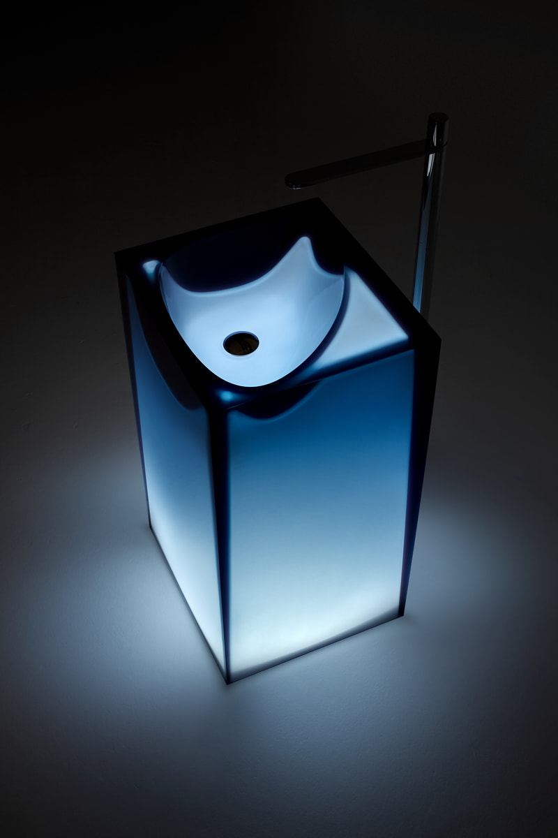 almost a mold generated by a stone falling from above, by a powerful and concentrated force that "pushes" the material downwards