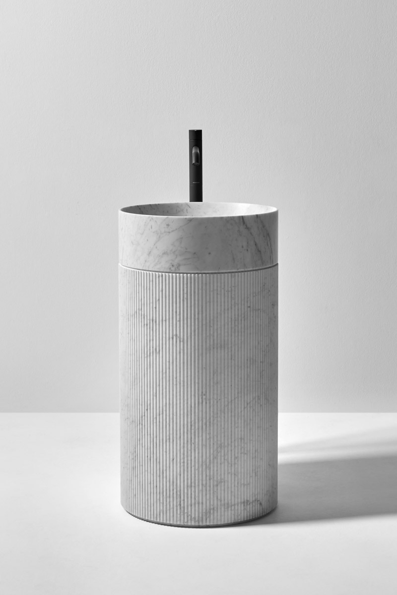 a compact form, vibrant with light and shadow