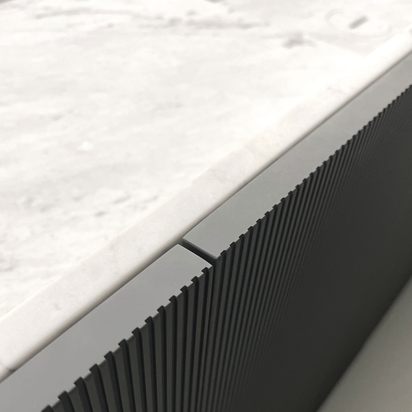 a modular sequence of bathtubs and countertops