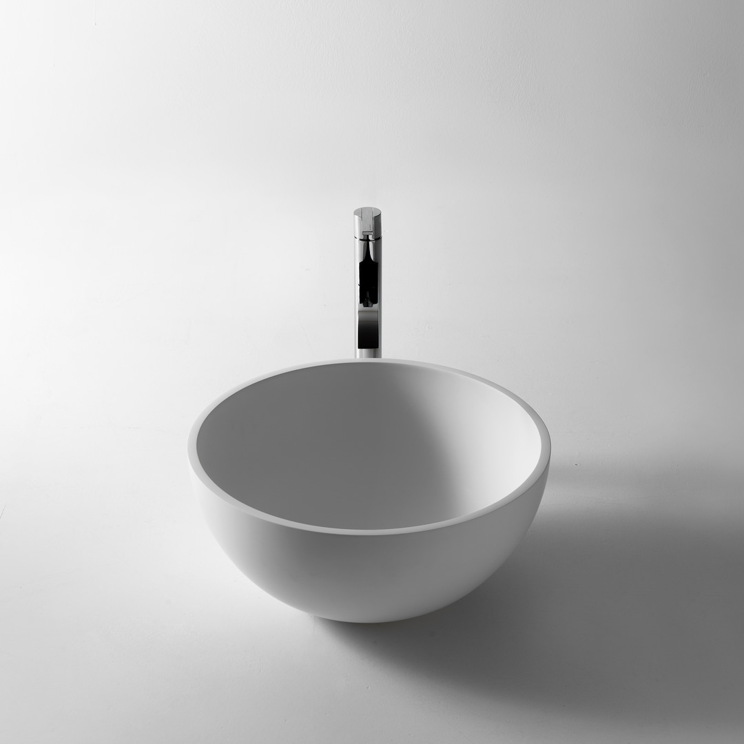 statuary and sculptural in its presence