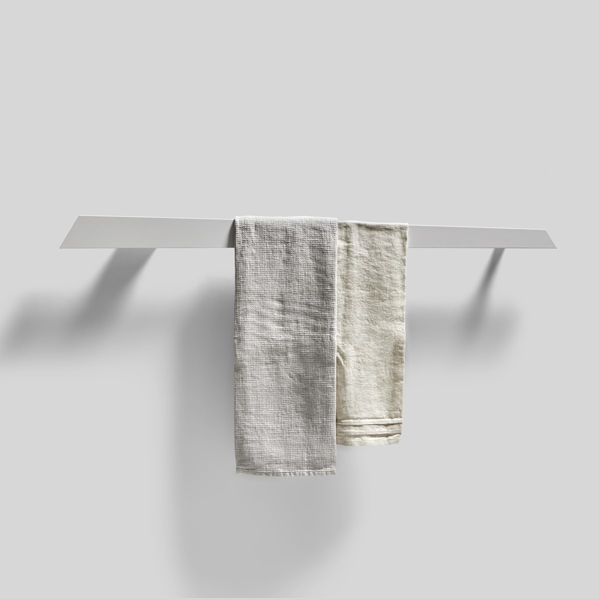 an aluminum blade that marks the wall