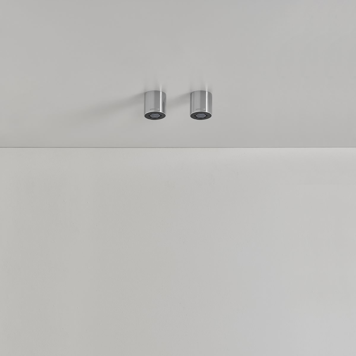 A small cylinder anchored to the ceiling