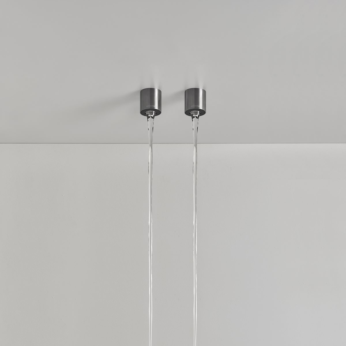 A small cylinder anchored to the ceiling